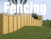 Fence on grassy hill